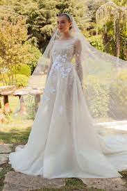 This viral tiktok challenge has women wearing their old wedding dresses to surprise their spouses, and it's very wholesome. Georges Hobeika Bridal Bridal Fw20 21 Look 17 Wedding Dresses Bridal Bridal Wedding Dresses