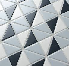 Are you not swooning over this concrete tile floor filled with geometric inspiration? Blue Mountain Kaleidoscope 2 Triangle Geometric Tiles Design Ant Tile Triangle Tiles Mosiacs Floors Kitchen Bathroom Walls Accents