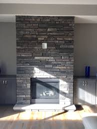 This post contains some affiliate links for your. Gray And Brown Dry Stacked Stone Fireplace Stacked Stone Fireplaces Stone Fireplace Pictures Stone Fireplace