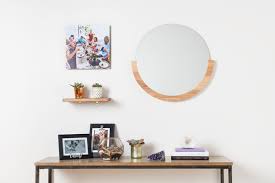 Hallways and less important areas can often take a series of prints. Tips On How High To Hang A Mirror For Your Space I Shutterfly