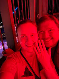 Proposing in the Eiffel Tower at sunset