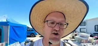 Burning Man ravers abandon cars, blankets and their own waste