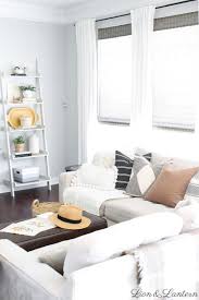 And then there's the vase full of greenery on the timber floating shelf, and the potted plant on the timber coffee table. Fall Shelf Styling Modern Boho Caitlin Marie Design