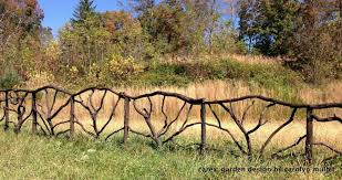 Unique Wood Fence Made Of Branches Rustic Garden Fence Garden In The Woods Rustic Fence