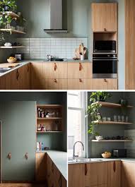 This Apartment Above A Shop Received A Contemporary Update Green Kitchen Cabinets Modern Kitchen Green Kitchen Interior