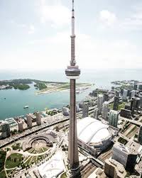 Edgewalk at the cn tower, toronto's most extreme attraction. The Cn Tower S Edgewalk Is Reopening With New Safety Measures