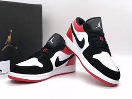 These sneakers released in 2019 and retailed for $90. Nike Air Jordan 1 Black Toe Low Novocom Top
