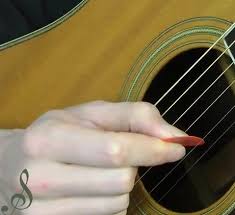How to hold the guitar pick the main thing to remember when holding the plectrum is not to hold it too firmly. How To Hold A Guitar Pick