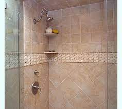 While tiles were initially reserved for wet spots on the walls and floor, for a small bathroom, they can be used to create a statement and act as a point of focus of your small bathroom. Bathroom Tile Gallery Basement Bathroom Bathroom Tile Designs Tile Bathroom Bathroom Cabinets Designs