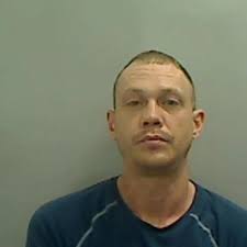 Thug who slashed legs of teen with zombie knife given 15-year sentence to  'protect public'