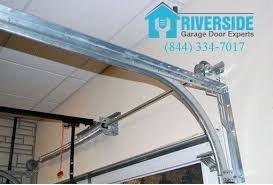 Fix A Garage Door Bent Tracks Bent Tracks On Your Garage Front Door Require Quick Alter To Have Th Garage Door Track Garage Door Installation Best Garage Doors