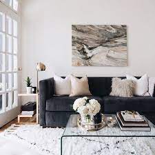 Gray upholstery also provides a lovely base for neutral color schemes. Elements Of A Cozy Morning A Big Surprise Ashlina Kaposta Living Room Inspiration Apartment Living Room Living Room Designs
