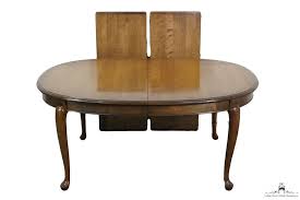 Two armchairs and four side chairs each feature a curved backrest with vertical. Ethan Allen Classic Manor 100 Oval Queen Anne Dining Table 15 6004 Dining Table Ethan Allen Dining Table