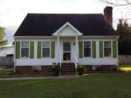 Exterior louvered shutters for windows can be installed for functional use with our optional shutter hardware. Finally Did It Spray Painted The Old Faded Hunter Green Shutters To A Vibrant Fresh Green Looks Good House Paint Exterior Green Shutters Exterior House Color