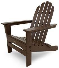 Sunbrella's innovative weatherproof fabric repels moisture and retains color so you can leave them out in the sun or get them soaked in a family water balloon fight without worry. Trex Outdoor Furniture Cape Cod Folding Adirondack Chair Vintage Lantern By Trex Ou Folding Adirondack Chairs Wood Adirondack Chairs Plastic Adirondack Chairs