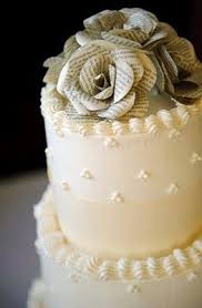 The flower boasts a gorgeous rhinestone and pearl center and this would be perfect for bride on a budget and yet not willing to comprimise on style! Oh What Fun Book Page Flowers Wedding Cake Toppers Wedding Cake Fresh Flowers Book Themed Wedding Cake