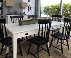 Farmhouse Table And Spindle Chairs By Joanna Gaines For Magnolia Home At Toms Price Farmhouse Kitchen Tables Rustic Dining Furniture Dining Furniture Makeover