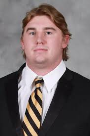 Dortch Rewrites History in 51-20 Win over Towson