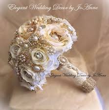 It is overflowing with parrot tulips and bouvardia. Vintage Ivory And Gold Brooch Bouquet Custom Ivory And Gold Wedding Bouquet Vintage Jeweled Wedding Bouquet Custom Bouquet Deposit Only