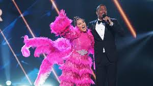 In separate interviews thursday, tvline chatted with daughtry and the real host/flamingo adrienne bailon for some inside scoop on the loony singing. Masked Singer Adrienne Bailon Never Told Her The Real Co Hosts