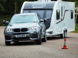 I want to pull a spec miata (2200lbs) on an open trailer. Bmw X3 Practical Caravan