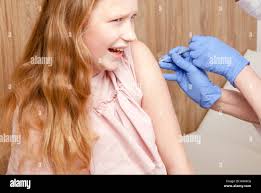 Vaccination child school hi-res stock photography and images