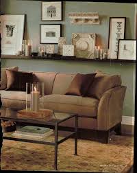 Pottery barn is an american upscale home decor and furnishing store. Love The Candles Ledge From Older Pottery Barn Catalog Abovecouch Barn Candles Catalog Led Modern Rustic Living Room Shelves Above Couch Above Couch