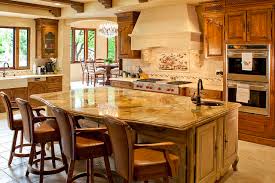 A waterfall countertop is easily recognizable by the fact that it drops vertically down the sides instead of stopping abruptly at the edge of a cabinet or island. Stunning Kitchen Granite Counter Island American Traditional Kitchen Los Angeles By Surfaces Usa Houzz