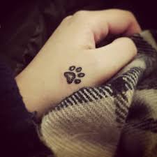Had skys paw print tattooed on my wrist love my husky. 47 Tiny Paw Print Tattoos For Cat And Dog Lovers Revelist