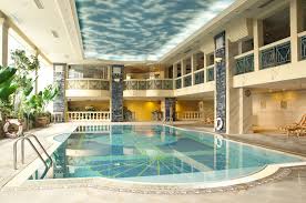 Two Story Indoor Pool Rectangular With Decorated Floor At New Orient Landmark Hotel In Macau Sar China Hotel Landmark Hotel Indoor Pool