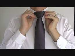Put on the tie drape the necktie around step 7: How To Tie A Tie Windsor Aka Full Windsor Or Double Windsor For Beginners Youtube