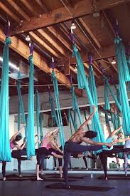Air A Unique Combination Of Resistance And Suspension Achieved By Hanging From The Ceiling In Gorgeous Silk Ham Yoga Studio Design Yoga Studio Aerial Fitness