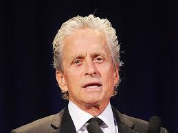 Is Michael Douglas still smoking despite throat cancer?
