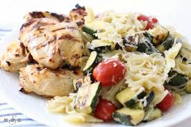 Chicken contains little fat and lots of protein, can be cooked in a short amount of time and can be mixed with lots of other foods, from vegetables to peanut butter, to create a meal. Grilled Italian Chicken Pasta Butter With A Side Of Bread
