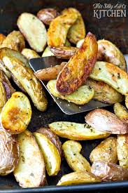 Rosemary Roasted Fingerling Potatoes This Silly Girl S Kitchen Recipe Roasted Fingerling Potatoes Fingerling Potatoes Recipes