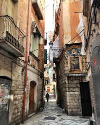 The Streets Of Bari Vecchia Old Bari Are Combined Of Winding Alleys And Corner Bars Consisting Of The Loc Amalfi Coast Italy Travel Destinations Italy Puglia