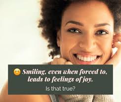 How do introverts feel when someone smiles at them?