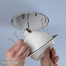 Some recessed led light fixtures can be pulled directly out of the ceiling. Upgrade A Recessed Light Fixture Diy Family Handyman
