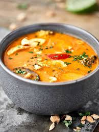 This Slow Cooker Thai Chicken Soup Is Loaded With Creamy Coconut Milk Peanut Butter Re Slow Cooker Thai Chicken Chicken Soup Recipes Soup Recipes Slow Cooker