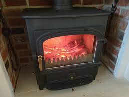 Wall covering behind wood burning stove wood burning stove with gl 3x12 tile vlaze heatshields can reduce the rock tile wall behind woodstove page pressed tin panels used as a fire place chimney thimbles ping safely wood burning stove with gl 3x12 tile. What To Put Behind A Wood Burning Stove Fireplace Universe