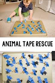 This activty alone can give hours of entertainment for toddlers on a rainy day. Animal Tape Rescue Activity Busy Toddler Toddler Activities Daycare Toddler Activities Toddler Learning Activities