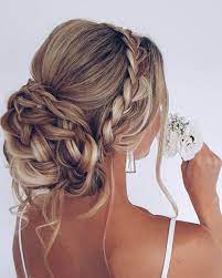 If you have long hair, your wedding updo options are endless.braids, buns and chignons are all possibilities. Essential Guide To Wedding Hairstyles For Long Hair
