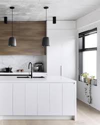 Design a kitchen that stands the test of time. A Modern Kitchen With A Timeless Palette White Modern Kitchen Classic Kitchen Design Modern Kitchen Design