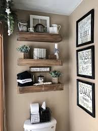 They accommodate tissue paper rolls, wicker baskets, flowers in vase, and towels. 25 Amazing Diy Floating Shelves For Bathroom To Easy Organize Everything Bathroom Shelf Decor Diy Shelves Bathroom Floating Shelves Diy