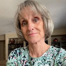 A new billboard went up in downtown Phoenix, AZ, featuring a shirtless  Trump chest-deep in a swamp—wearing a crown, and holding a Trump-brand  phone. In the background there is a nuclear blast,