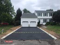 However, it can be weak along the edges, especially if you an effective solution is to line the edge of the driveway with bricks. Asphalt Driveway In Beekman Ln Hillsborough With Angled Granite Borders Maloney Paving And Masonry