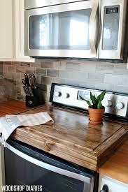 No matter the occasion or season, this wood stove cover would look great year round. Make A Diy Wooden Stove Top Cover And Add More Counter Space To Your Kitchen