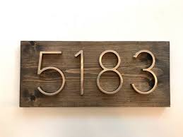 A house plaque that defines their newest purchase will always be greatly appreciated. Modern Rustic Address Plaque Horizontal House Number Plaque Etsy Rustic Address Plaque Rustic House Numbers Address Plaque
