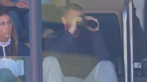 CJ Carr watches brother Tommy Carr make his first Michigan start at the Big House
