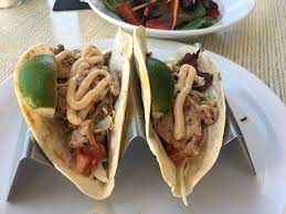 To assemble the grilled fish tacos, place several pieces of fish and some grilled chilies atop 2 stacked warm corn tortillas. Fish Tacos Picture Of Latitude 26 Naples Tripadvisor